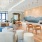 a lobby with couches chairs and a large island