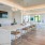 an entertainment kitchen in a lounge with an island