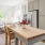 a kitchen with a dining table